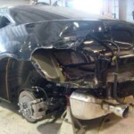 Photographs of a 2014 Chevrolet Camaro that was in an accident and repaired by Elite Paint & Body Shop in West Palm Beach Florida